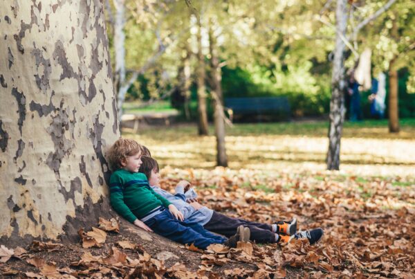 Quiet Sunday strolls around the Botanic garden, people watching including this family of three brothers having a quick breather in between their games.
